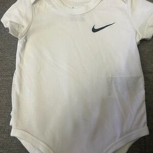 Nike White Bodysuit with Iconic Swoosh Design